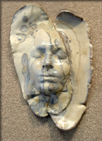 Stoneware mask by Garnetta Sullivan